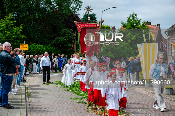 Thousands of people are attending the ''Boxmeerse Vaart,'' an ancient Holy Blood procession, in Boxmeer, Netherlands, on June 2, 2024. 