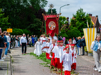 Thousands of people are attending the ''Boxmeerse Vaart,'' an ancient Holy Blood procession, in Boxmeer, Netherlands, on June 2, 2024. (