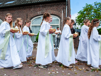 Thousands of people are attending the ''Boxmeerse Vaart,'' an ancient Holy Blood procession, in Boxmeer, Netherlands, on June 2, 2024. (