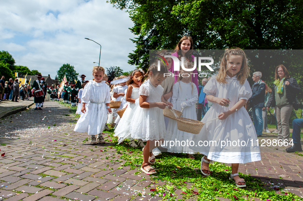 Thousands of people are attending the ''Boxmeerse Vaart,'' an ancient Holy Blood procession, in Boxmeer, Netherlands, on June 2, 2024. 