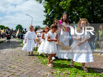 Thousands of people are attending the ''Boxmeerse Vaart,'' an ancient Holy Blood procession, in Boxmeer, Netherlands, on June 2, 2024. (