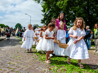 Thousands of people are attending the ''Boxmeerse Vaart,'' an ancient Holy Blood procession, in Boxmeer, Netherlands, on June 2, 2024. (