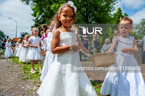 Thousands of people are attending the ''Boxmeerse Vaart,'' an ancient Holy Blood procession, in Boxmeer, Netherlands, on June 2, 2024. 