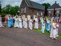 Thousands of people are attending the ''Boxmeerse Vaart,'' an ancient Holy Blood procession, in Boxmeer, Netherlands, on June 2, 2024. (