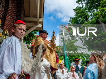 Thousands of people are attending the ''Boxmeerse Vaart,'' an ancient Holy Blood procession, in Boxmeer, Netherlands, on June 2, 2024. (