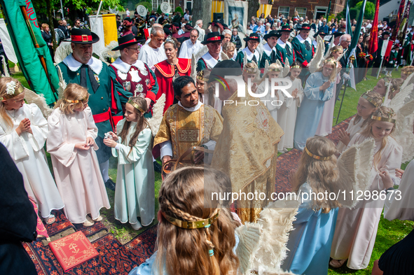 Thousands of people are attending the ''Boxmeerse Vaart,'' an ancient Holy Blood procession, in Boxmeer, Netherlands, on June 2, 2024. 