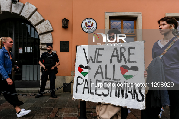 Palestinians and their supporters hold a protest in support of Palestine and against Israeli war actions in the Gaza Strip in fron of the Un...