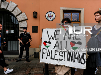 Palestinians and their supporters hold a protest in support of Palestine and against Israeli war actions in the Gaza Strip in fron of the Un...