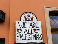 Pro-Palestine placard is seen against the United States's consulate in Krakow sign as Palestinians and their supporters hold a protest in su...