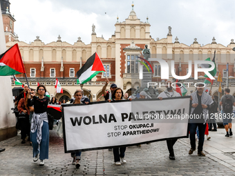 Palestinians and their supporters hold a protest in support of Palestine and against Israeli war actions in the Gaza Strip in the Main Marke...