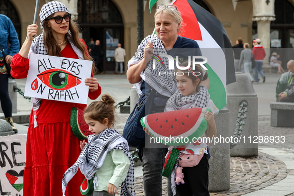 Palestinians and their supporters hold a protest in support of Palestine and against Israeli war actions in the Gaza Strip in the Main Marke...