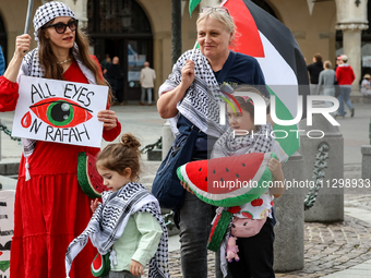 Palestinians and their supporters hold a protest in support of Palestine and against Israeli war actions in the Gaza Strip in the Main Marke...