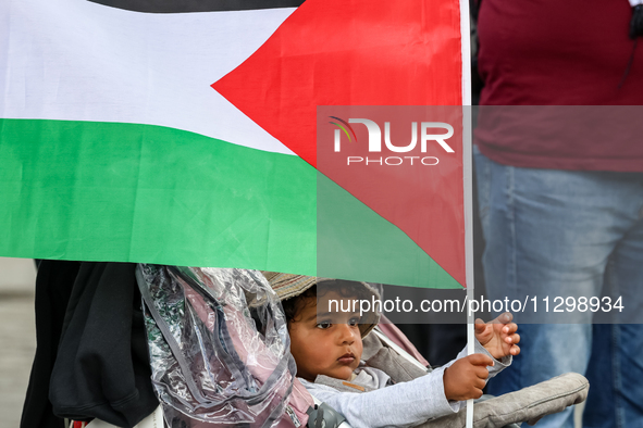 Palestinians and their supporters hold a protest in support of Palestine and against Israeli war actions in the Gaza Strip in the Main Marke...