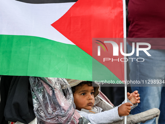 Palestinians and their supporters hold a protest in support of Palestine and against Israeli war actions in the Gaza Strip in the Main Marke...