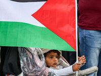 Palestinians and their supporters hold a protest in support of Palestine and against Israeli war actions in the Gaza Strip in the Main Marke...