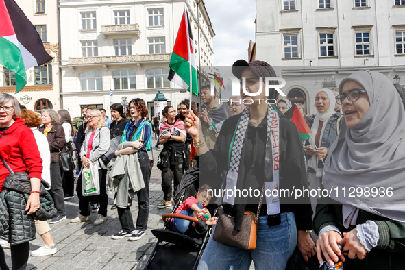 Palestinians and their supporters hold a protest in support of Palestine and against Israeli war actions in the Gaza Strip in the Main Marke...