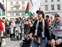 Palestinians and their supporters hold a protest in support of Palestine and against Israeli war actions in the Gaza Strip in the Main Marke...