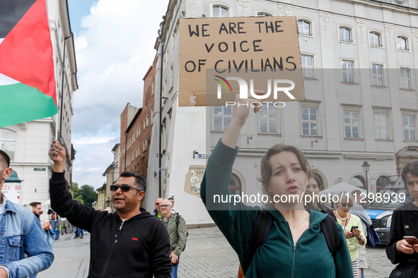 Palestinians and their supporters hold a protest in support of Palestine and against Israeli war actions in the Gaza Strip in the Main Marke...