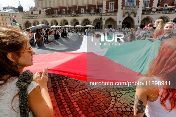 Palestinians and their supporters hold a protest in support of Palestine and against Israeli war actions in the Gaza Strip in the Main Marke...