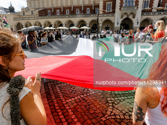 Palestinians and their supporters hold a protest in support of Palestine and against Israeli war actions in the Gaza Strip in the Main Marke...