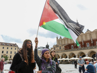 Palestinians and their supporters hold a protest in support of Palestine and against Israeli war actions in the Gaza Strip in the Main Marke...