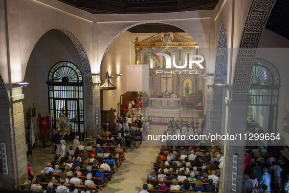 Hundreds of people are celebrating Corpus Christi Day with a procession in San Sebastian de los Reyes, Madrid, Spain, on June 2, 2024. Diffe...