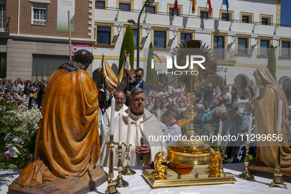 Hundreds of people are celebrating Corpus Christi Day with a procession in San Sebastian de los Reyes, Madrid, Spain, on June 2, 2024. Diffe...