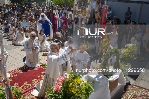 Hundreds of people are celebrating Corpus Christi Day with a procession in San Sebastian de los Reyes, Madrid, Spain, on June 2, 2024. Diffe...