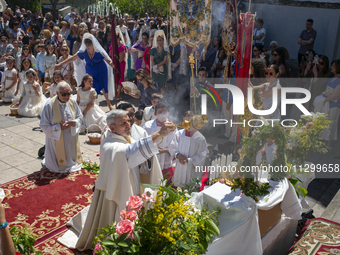 Hundreds of people are celebrating Corpus Christi Day with a procession in San Sebastian de los Reyes, Madrid, Spain, on June 2, 2024. Diffe...