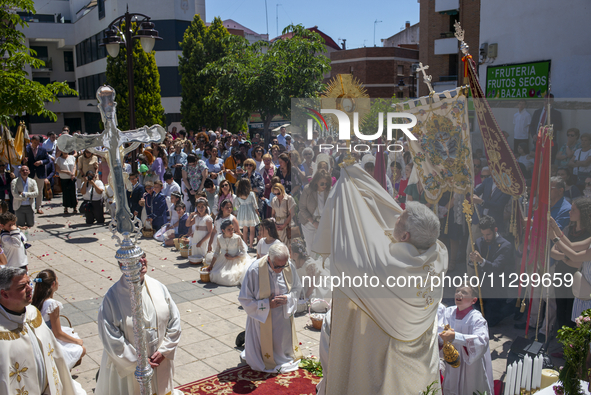 Hundreds of people are celebrating Corpus Christi Day with a procession in San Sebastian de los Reyes, Madrid, Spain, on June 2, 2024. Diffe...