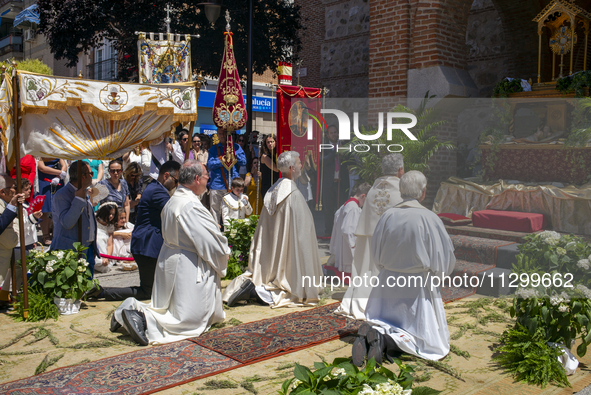 Hundreds of people are celebrating Corpus Christi Day with a procession in San Sebastian de los Reyes, Madrid, Spain, on June 2, 2024. Diffe...