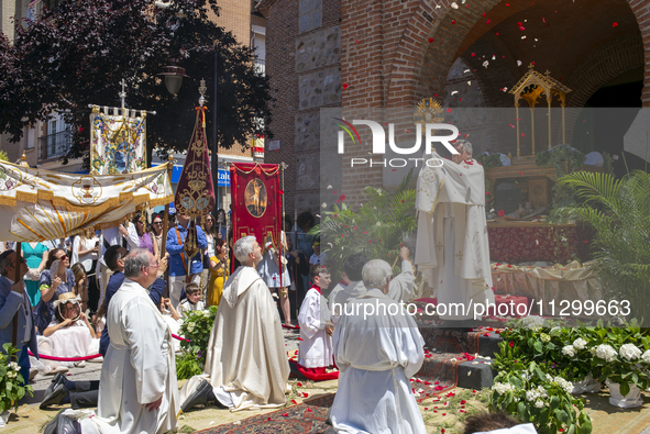 Hundreds of people are celebrating Corpus Christi Day with a procession in San Sebastian de los Reyes, Madrid, Spain, on June 2, 2024. Diffe...