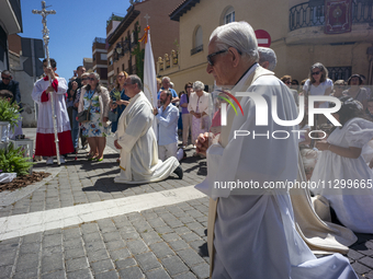 Hundreds of people are celebrating Corpus Christi Day with a procession in San Sebastian de los Reyes, Madrid, Spain, on June 2, 2024. Diffe...