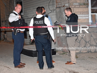 Chicago police are canvassing the area for evidence. A male victim is dying after being shot twenty-five times in a double shooting in Chica...