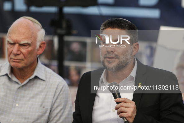 Israel's Finance Minister Bezalel Smotric is looking on as he addresses the relatives of Israelis being held hostage by Palestinian Hamas mi...