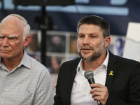 Israel's Finance Minister Bezalel Smotric is looking on as he addresses the relatives of Israelis being held hostage by Palestinian Hamas mi...