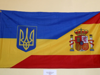 A flag with the colors of Spain and Ukraine is being exhibited during the open day held at the Bruch Barracks in Barcelona, Spain, on June 2...