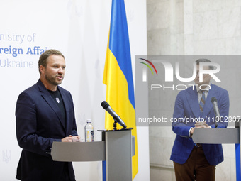 Minister of Foreign Affairs of Ukraine Dmytro Kuleba (R) and Minister of Foreign Affairs of the Republic of Estonia Margus Tsahkna are being...