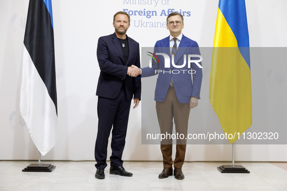 Minister of Foreign Affairs of Ukraine Dmytro Kuleba (R) is shaking hands with Minister of Foreign Affairs of the Republic of Estonia Margus...