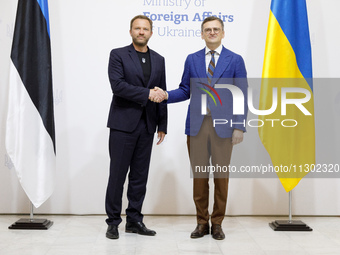 Minister of Foreign Affairs of Ukraine Dmytro Kuleba (R) is shaking hands with Minister of Foreign Affairs of the Republic of Estonia Margus...