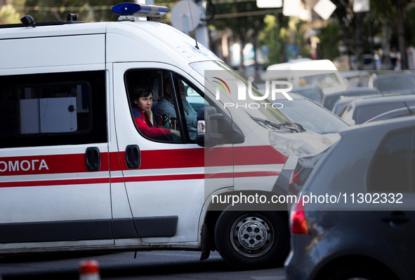 An ambulance is struggling through the traffic in the street of Kyiv, capital of Ukraine, in Kyiv, Ukraine, on June 3, 2024. NO USE RUSSIA....