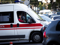 An ambulance is struggling through the traffic in the street of Kyiv, capital of Ukraine, in Kyiv, Ukraine, on June 3, 2024. NO USE RUSSIA....