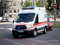 An ambulance is struggling through the traffic in the street of Kyiv, capital of Ukraine, in Kyiv, Ukraine, on June 3, 2024. NO USE RUSSIA....