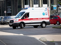 An ambulance is struggling through the traffic in the street of Kyiv, capital of Ukraine, in Kyiv, Ukraine, on June 3, 2024. NO USE RUSSIA....