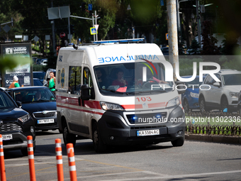 An ambulance is struggling through the traffic in the street of Kyiv, capital of Ukraine, in Kyiv, Ukraine, on June 3, 2024. NO USE RUSSIA....