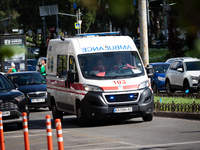 An ambulance is struggling through the traffic in the street of Kyiv, capital of Ukraine, in Kyiv, Ukraine, on June 3, 2024. NO USE RUSSIA....