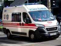 An ambulance is struggling through the traffic in the street of Kyiv, capital of Ukraine, in Kyiv, Ukraine, on June 3, 2024. NO USE RUSSIA....