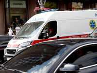 An ambulance is struggling through the traffic in the street of Kyiv, capital of Ukraine, in Kyiv, Ukraine, on June 3, 2024. NO USE RUSSIA....