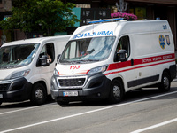 An ambulance is struggling through the traffic in the street of Kyiv, capital of Ukraine, in Kyiv, Ukraine, on June 3, 2024. NO USE RUSSIA....