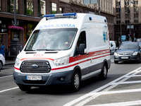 An ambulance is struggling through the traffic on Khreshchatyk Street in Kyiv, Ukraine, on June 3, 2024. NO USE RUSSIA. NO USE BELARUS. (